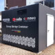 The picture illustrates a robust energy storage container located in the outdoor area of Göckemeyer Metallbau GmbH.