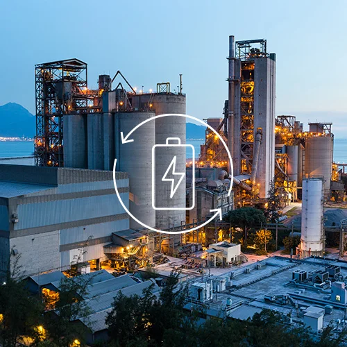 The image presents a section of an industrial area. In the foreground there is a white pictogram symbolizing energy supply.